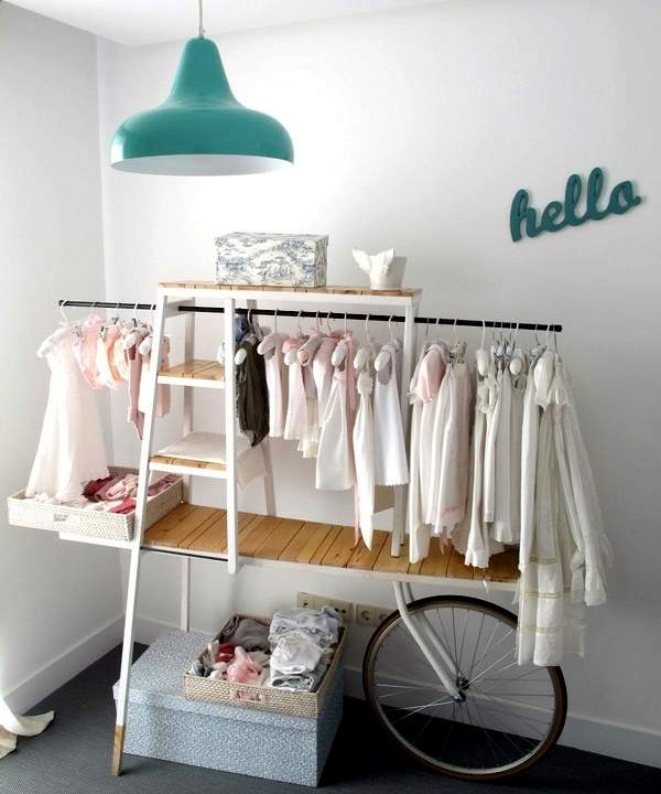 DIY baby nursery made with a bike and shelves