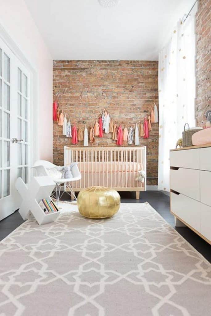 Trendy baby nursery brick wall