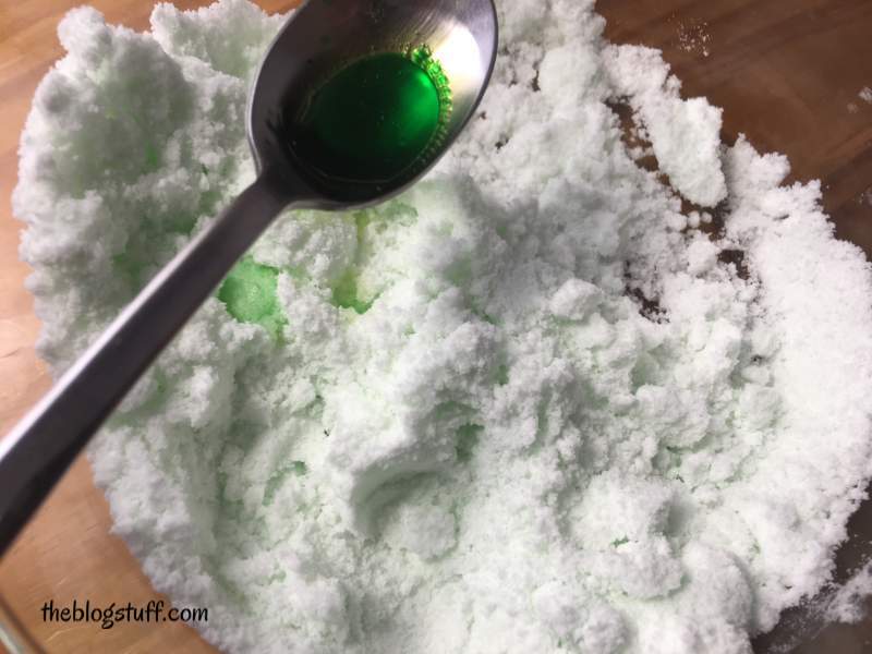 Mixing colorant and oils with dry ingredients