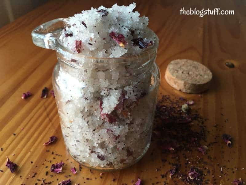 Rose and hibiscus sugar scrub in a jar