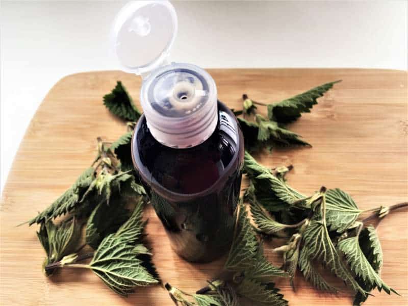 Homemade nettle hair growth shampoo in a bottle