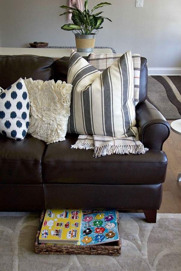 Sofa with an underneath basket to store books