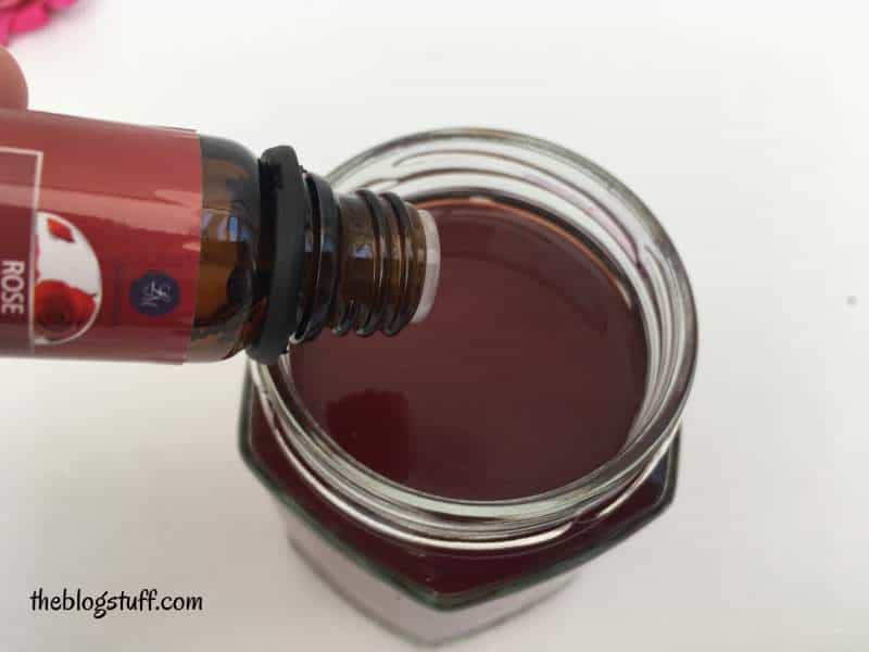 Adding essential oil to the rosewater