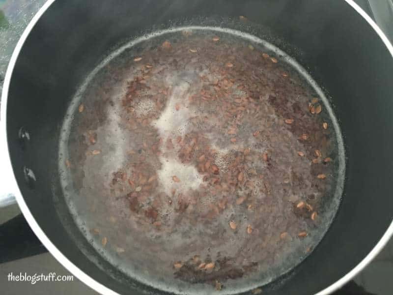 Boiling flaxseeds in a pot