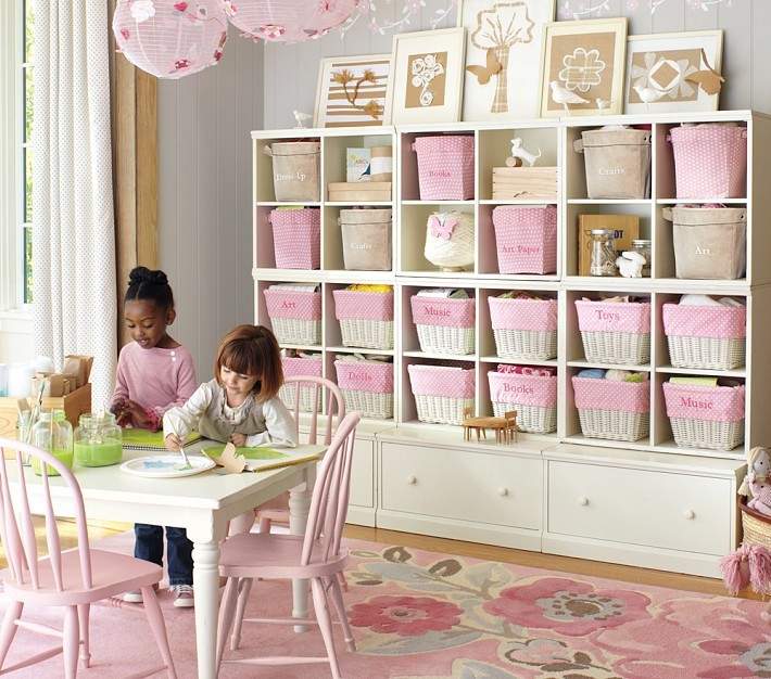 Girls' room with organized pink baskets 