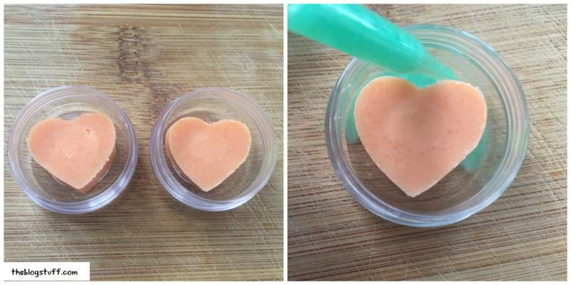 Adding melted Shea butter to glass containers