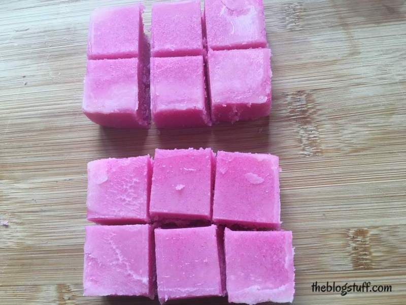 Cutting pink sugar scrub into cubes