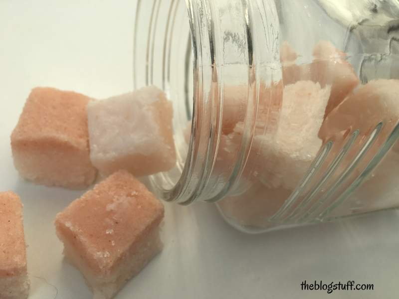 DIY sugar scrub cubes with Himalayan salts in an open jar