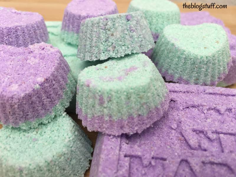 Green and purple homemade shower fizzes