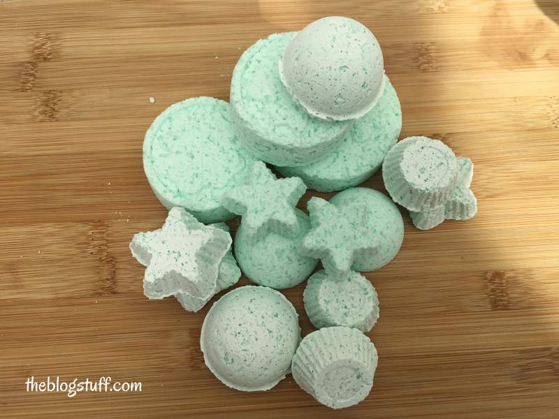 Green DIY shower melts on a table