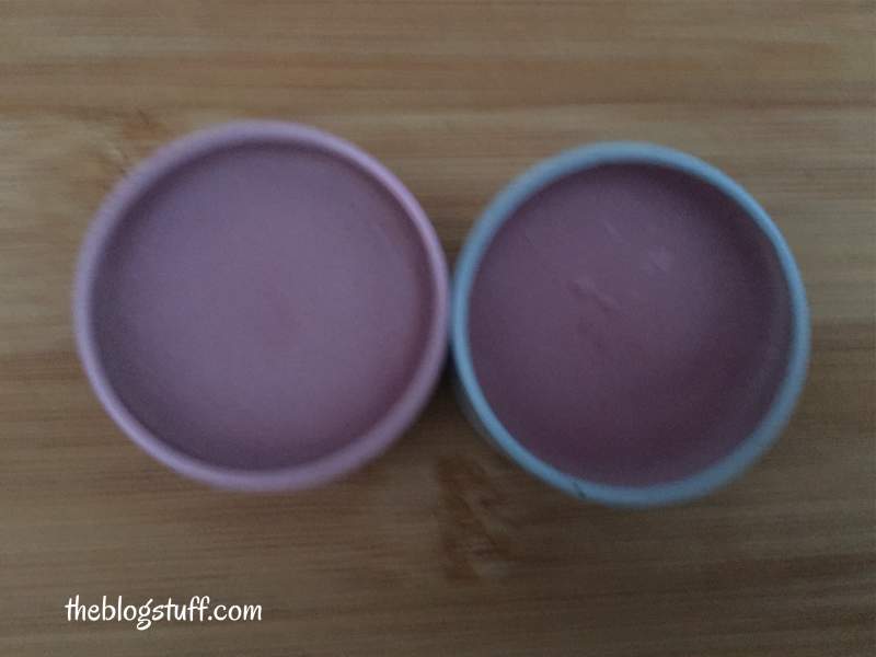 Purple lip balm in containers