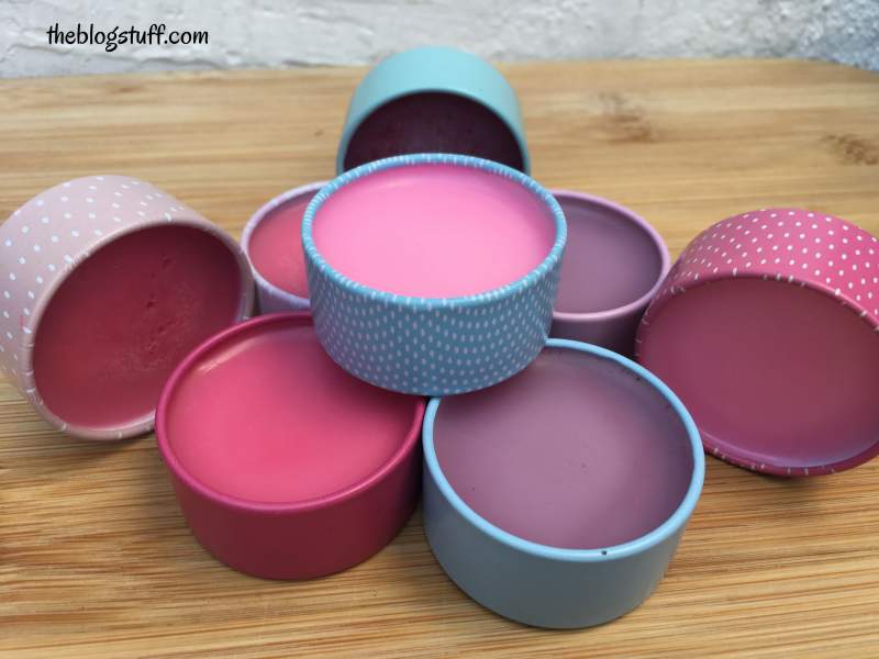 Homemade natural lip balms in containers