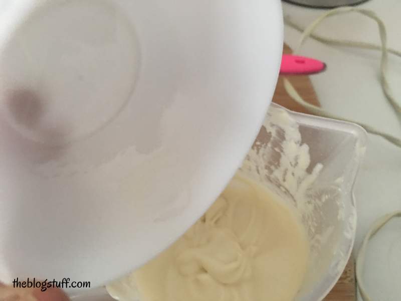 Adding the last ingredients to the emulsified eye cream