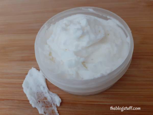 Homemade aloe vera face cream in a container