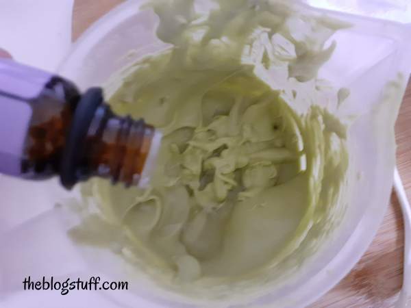 Adding essential oil to the Matcha face mask mixture