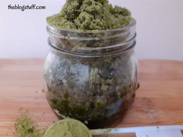 Matcha body scrub in a Mason jar