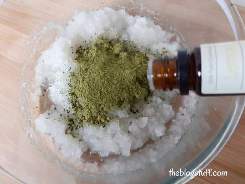 Adding Matcha green tea and essential oil to the mixture