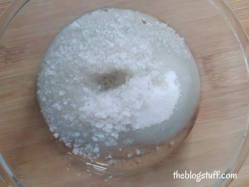 Sugar, salt, and carrier oil in a bowl