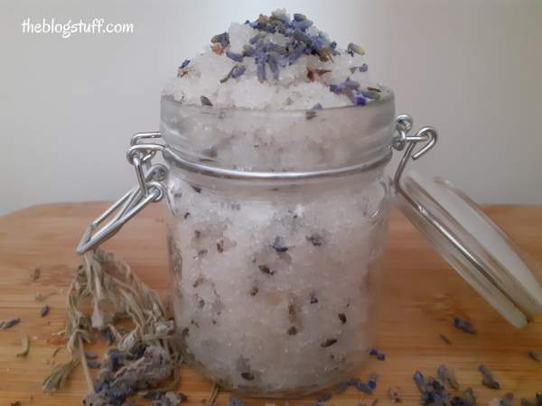 Homemade lavender sugar scrub in a Mason jar