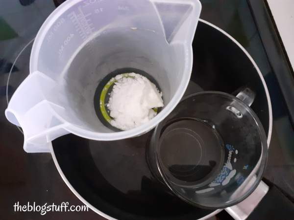 Heating Shea butter, wax, and distilled water in 2 containers