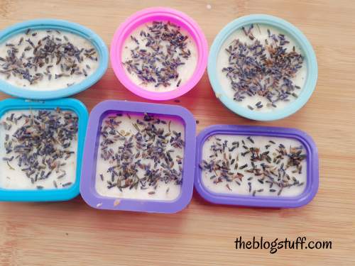 Adding lavender seeds to lavender soap mixture