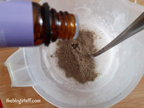 Adding lavender essential oil to the soap mixture