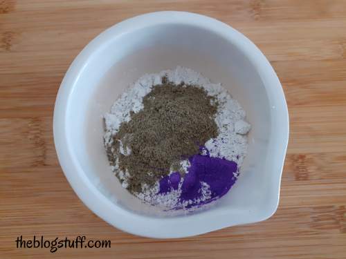 Clay powder, ground lavender seeds, and purple mica