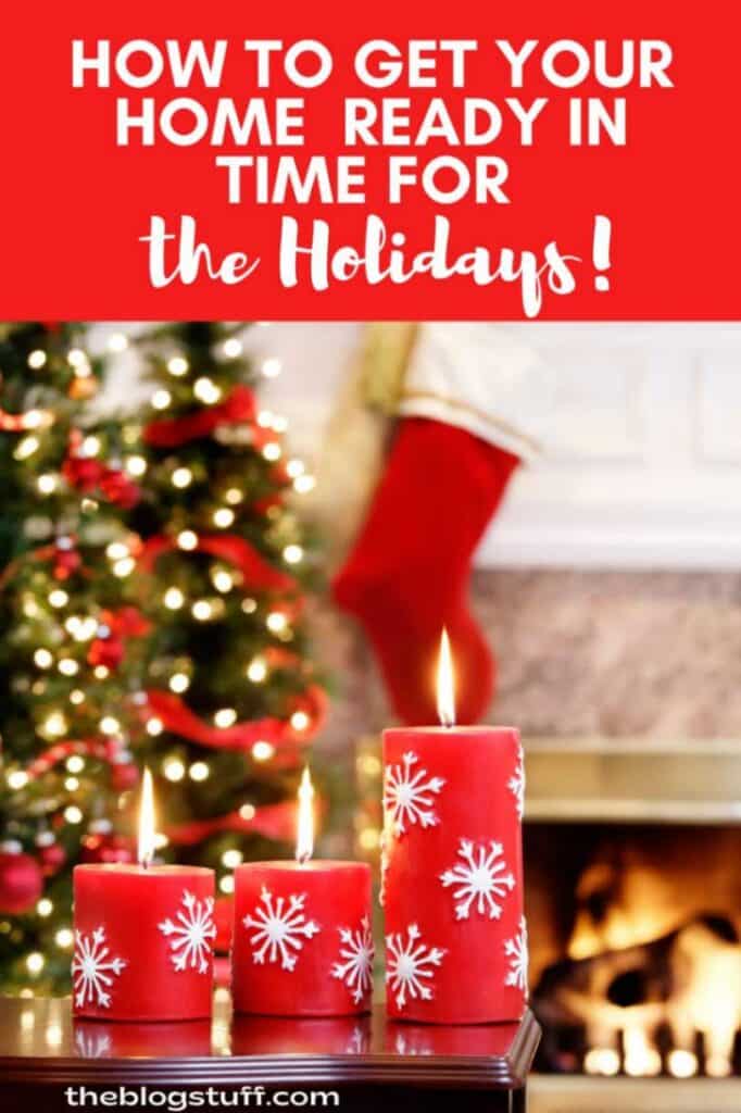 Three red candles with snowflake designs in front of a Christmas tree and fireplace. Text overlay reads: 'How to Get Your Home Ready in Time for the Holidays.