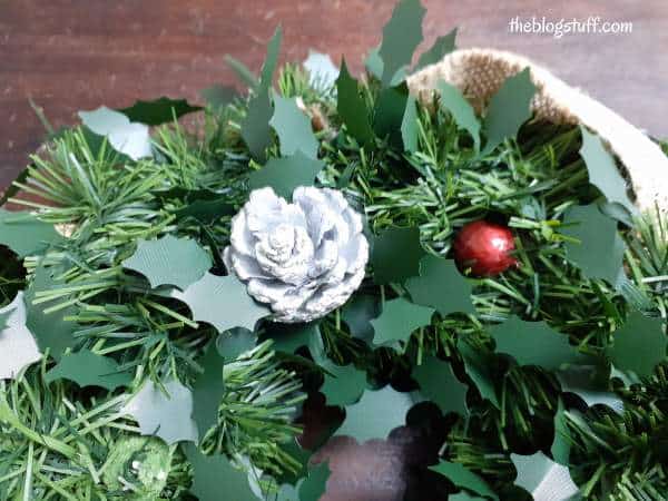 attach pine cone to diy christmas wreath