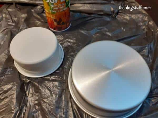 Spray paint and 2 metal pancakes