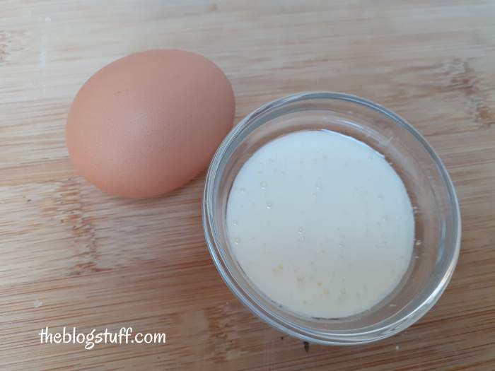 Egg and facial mask in a container