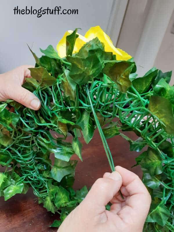 Adding flowers to the wreath