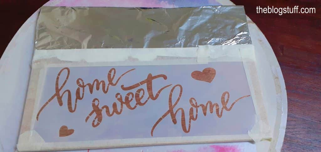 Making a wooden sign with the word home sweet home