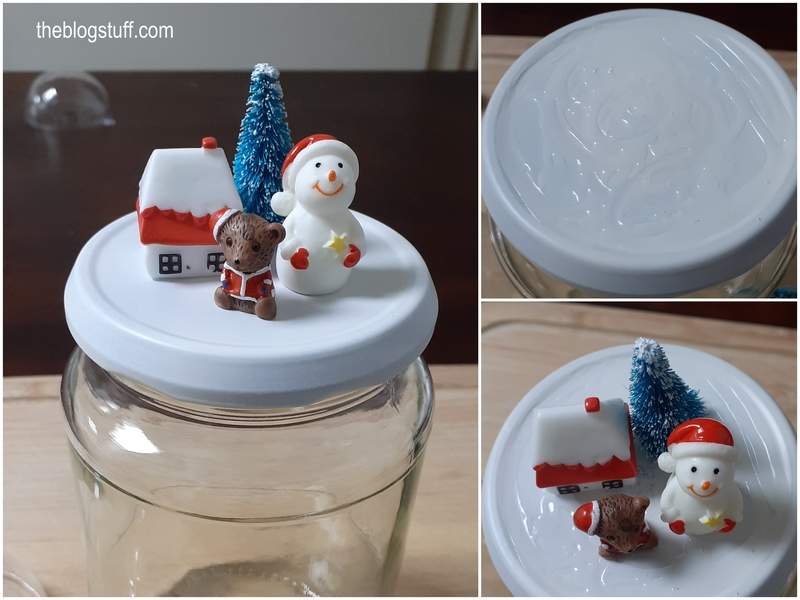 Decorating a glass jar lid with Christmas ornaments