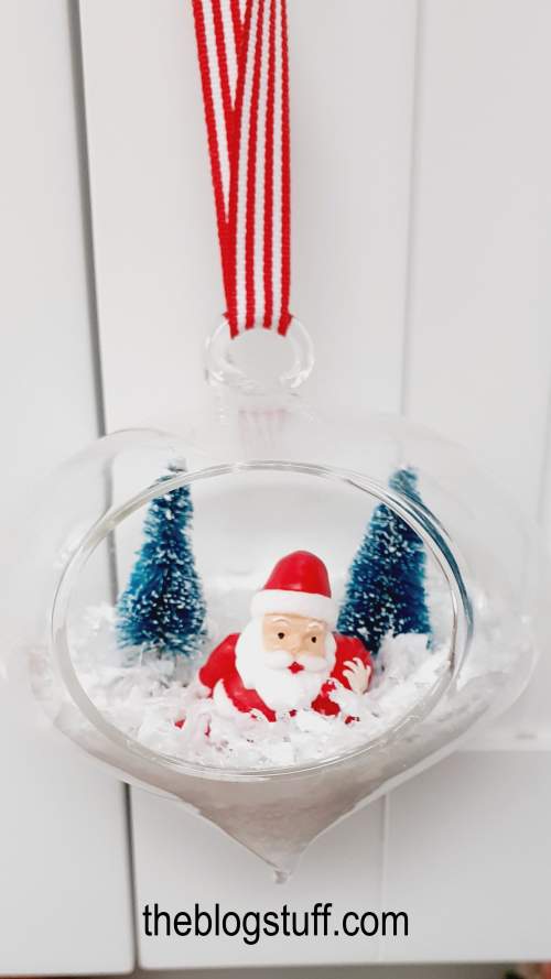 DIY Christmas bauble with papa Noel. fake snow and Christmas trees