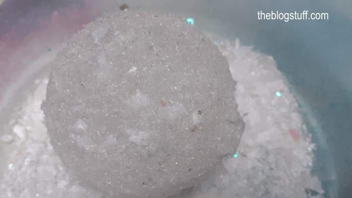 Covering DIY Christmas bauble with salt