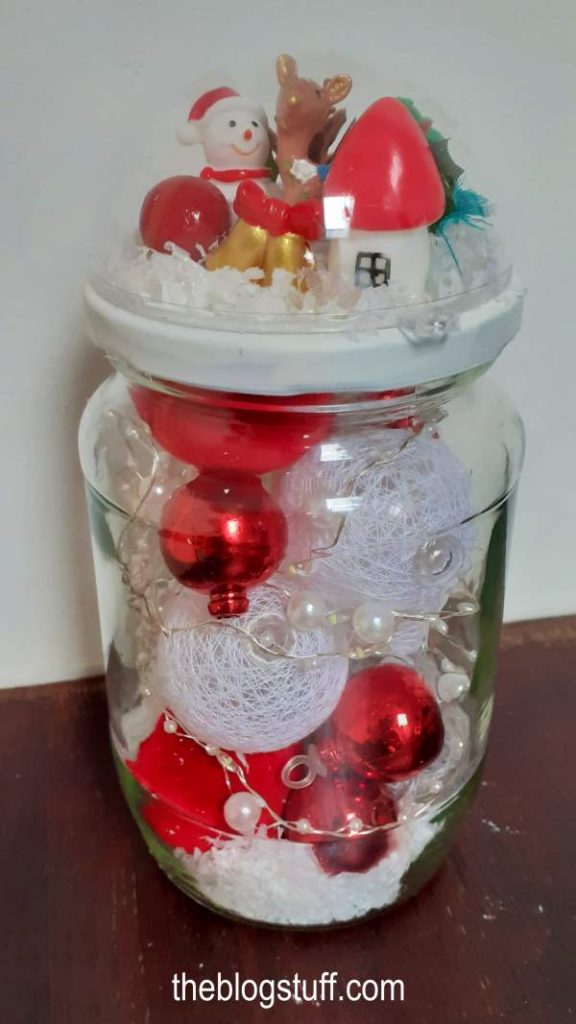 DIY Christmas Mason jar snow globe filled with baubles