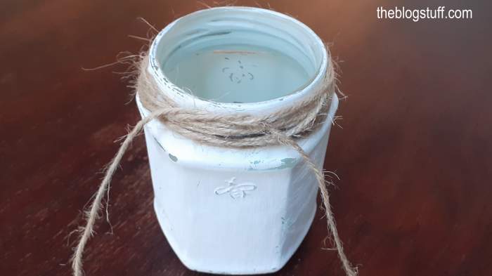 Glass jar with twine string around the neck