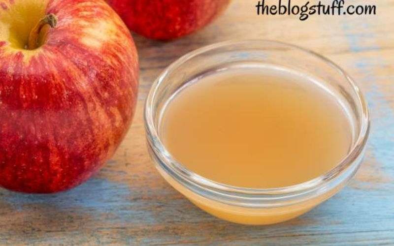 Apple and apple cider on a container