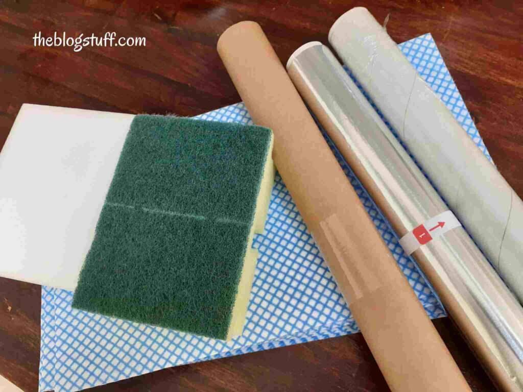 House cleaning supplies over a wooden table