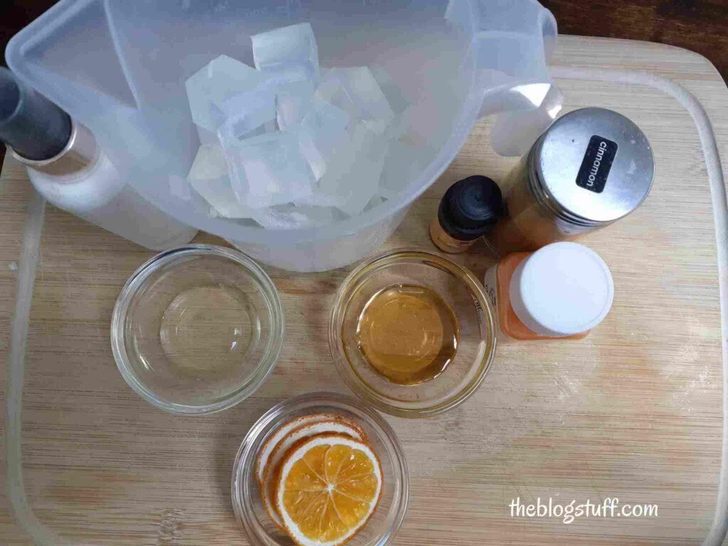 Ingredients to make pour and melt orange soap