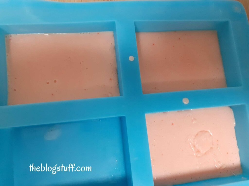 Half filled silicon molds with orange soap