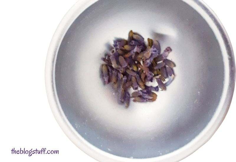 Dried lavender seeds placed at the bottom of a mold