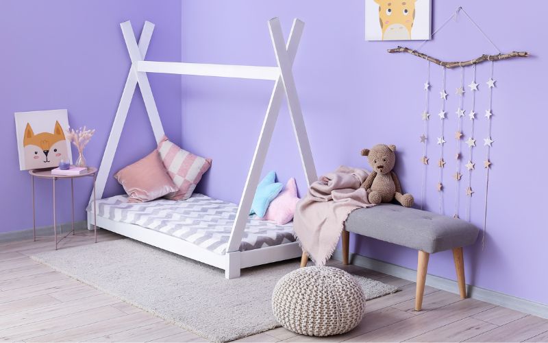 DIY wooden kids bed with decorative elements