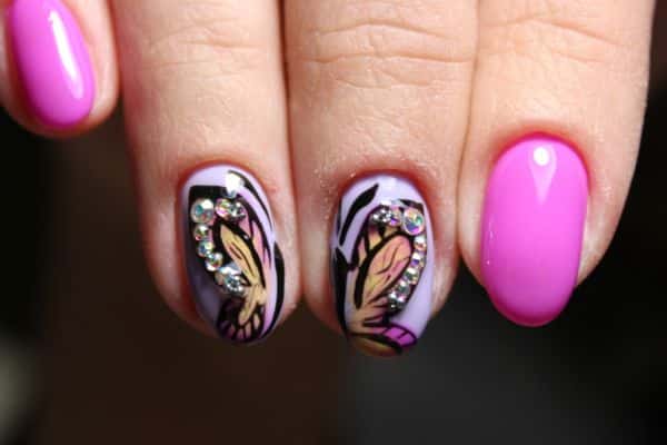 Hot pink spakling butterfly design in two nails