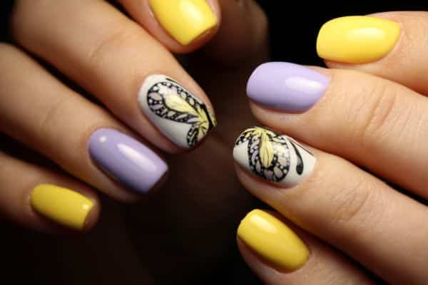 Purple and Yellow nails with butterflies