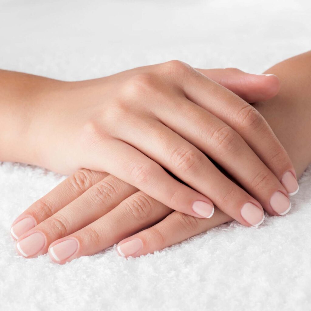 Hands with French manicure