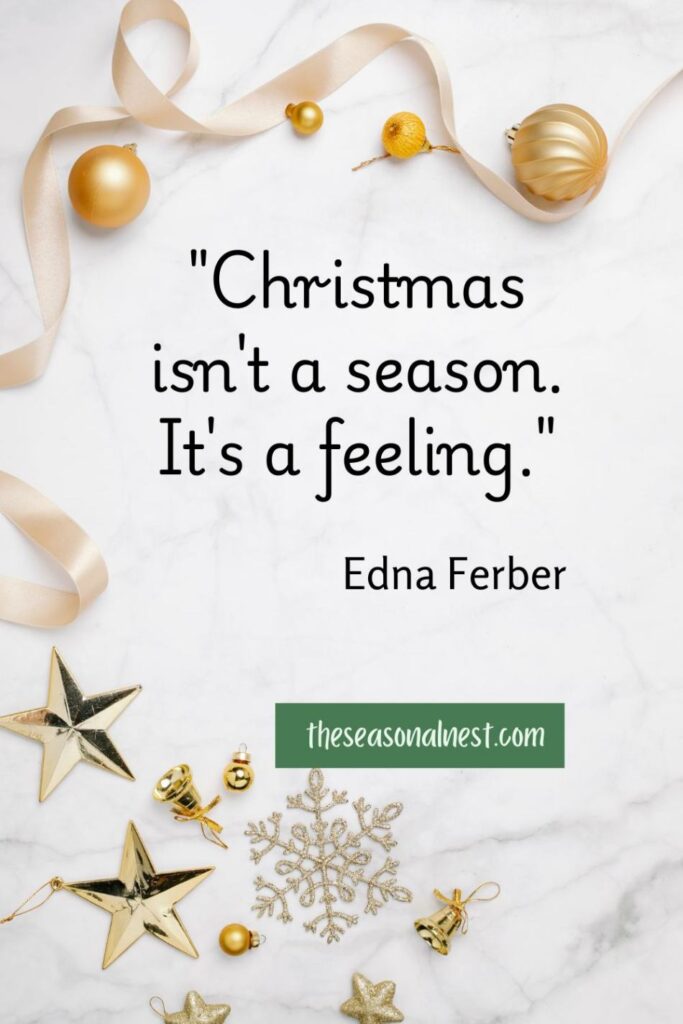 Motivational Christmas quote featuring golden ornaments, a soft ribbon, and delicate stars on a sleek marble background, conveying the magic of the holidays.