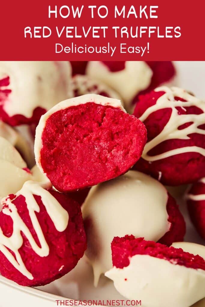 Close-up view of red velvet cake truffles coated in white chocolate and drizzle.