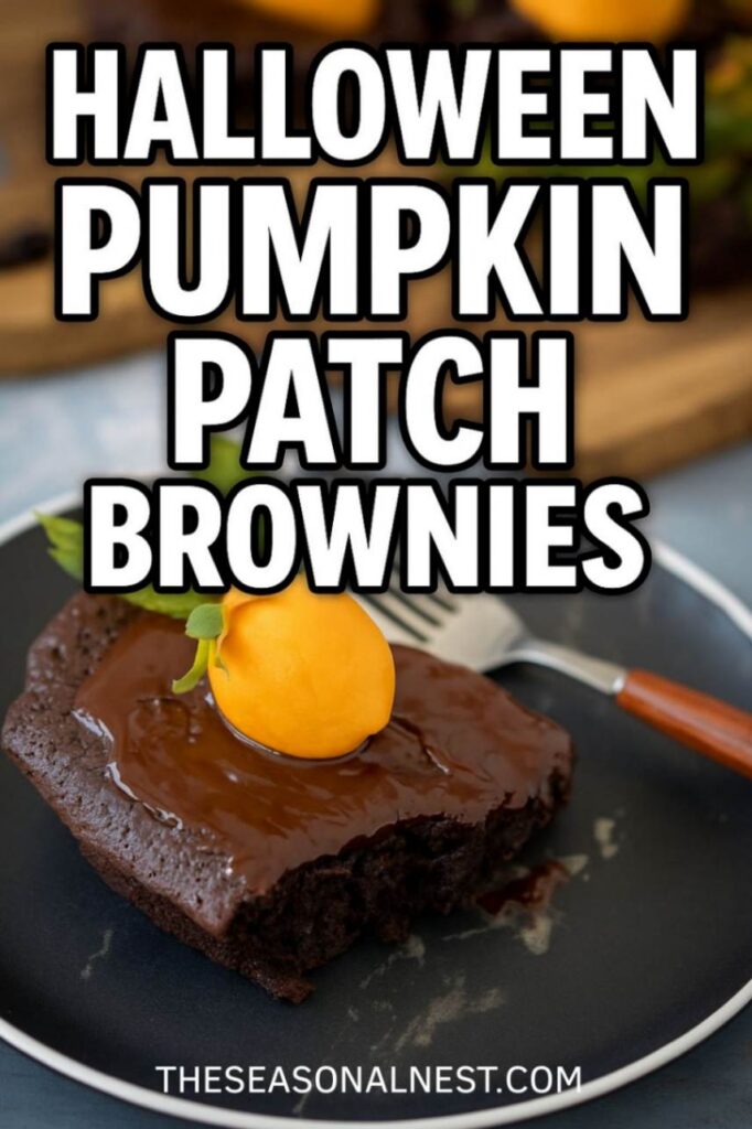 A piece of Chocolate Pumpkin Patch Brownie cake with an orange-dipped strawberry and a fork over a plate.